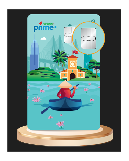 A vertical illustration of a VPBank Prime+ debit card design, showcasing a vibrant Vietnamese landscape. The design features a person in a conical hat paddling a boat among pink lotus flowers on water, with a traditional yellow-orange building and modern city skyline including a bridge in the background. The card also displays a prominent chip (magnified in a circle) and a contactless payment symbol at the top right, sitting on a golden cylindrical pedestal.